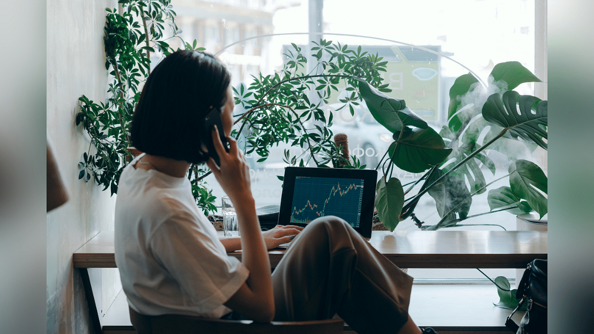 Representational image of a woman studying a statistical graph | Pexels Representational image | Pexels