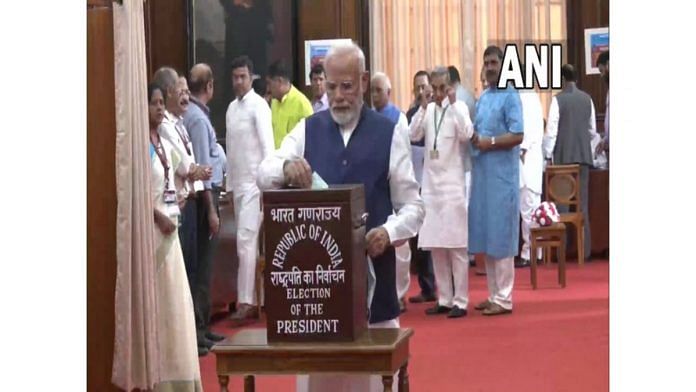 Prime Minister Narendra Modi casts his vote in the Presidential election, at the Parliament. (Photo/ANI)