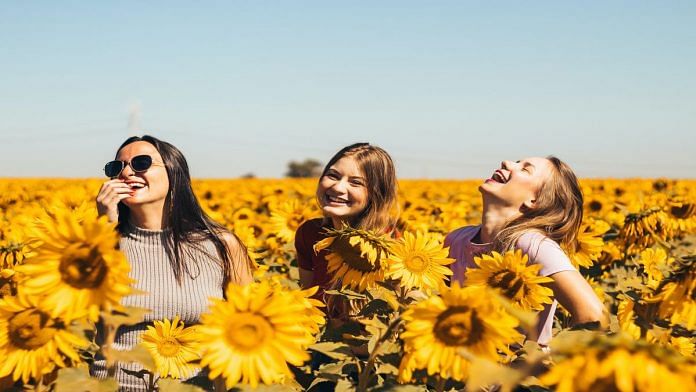 Representational image of three happy girls | Unsplash