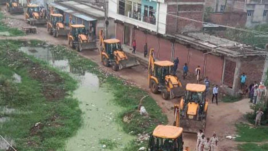 Bulldozers lined up at Rajiv Nagar Sunday | Photo: By special arrangement