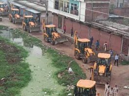 Bulldozers lined up at Rajiv Nagar Sunday | Photo: By special arrangement