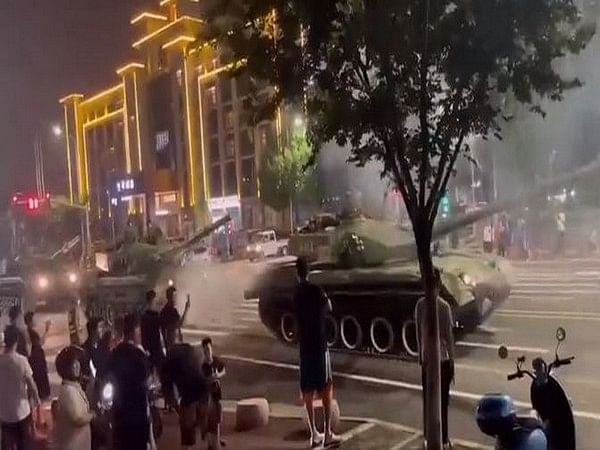 China deploys tanks to prevent people from withdrawing money from crisis-hit banks; grim reminder of Tiananmen Square incident
