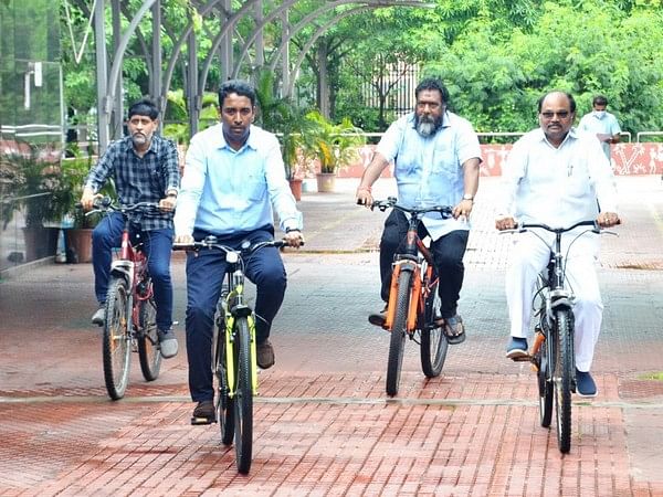 Greater Visakhapatnam Municipal Corporation employees reach office on bicycles to curb air pollution