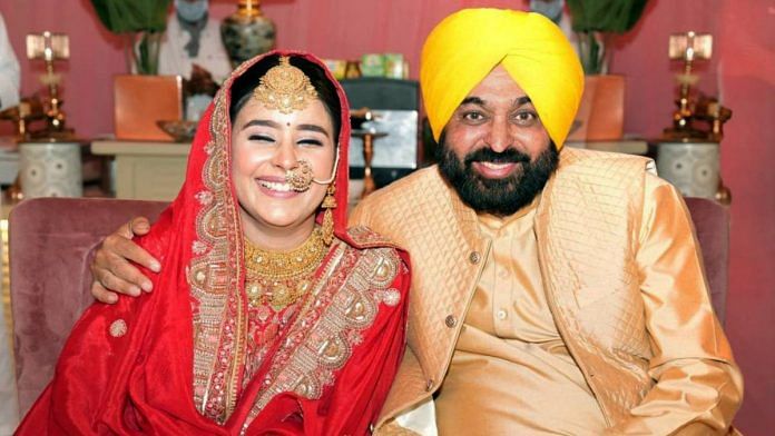 Bhagwant Mann poses with wife Gurpreet Kaur Thursday | ANI