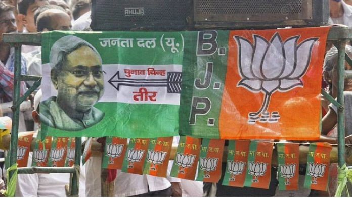 Representational image of BJP and JD(U) flags from a 2020 campaign rally in Bihar | Praveen Jain | ThePrint