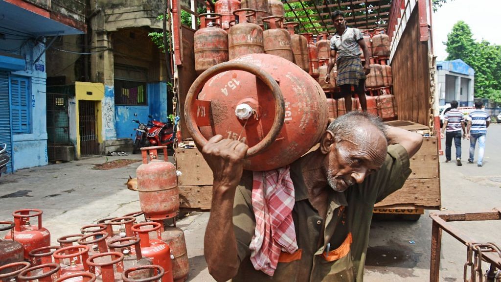 A truck laden with gas cylinders being unloaded in Kolkata | ANI