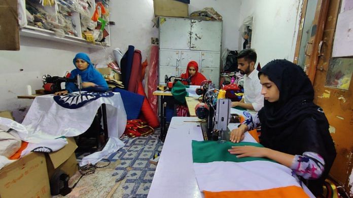 Workers at NN embroidery, one of the units that deals in flags and badges. | Reeti Agarwal | ThePrint
