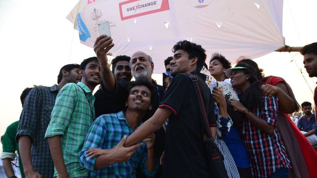 Attendees taking a selfie with journalist and media personality Sashi Kumar at the 2016 Kerala Literature Festival. The young audience often see these events as an opportunity to be 'up close and personal' with their idols. | Photo Credit: Facebook/@keralaliteraturefestival