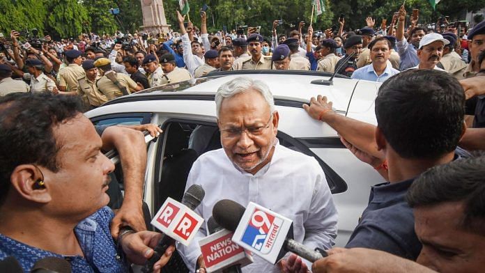 Janata Dal (United) leader Nitish Kumar interacts with the media after submitting his resignation to Bihar Governor Phagu Chauhan, outside Raj Bhavan in Patna, on 9 August 2022 | PTI