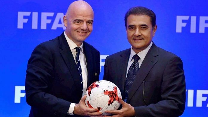 File photo of former AIFF chief Praful Patel with FIFA president Gianni Infantino | PTI