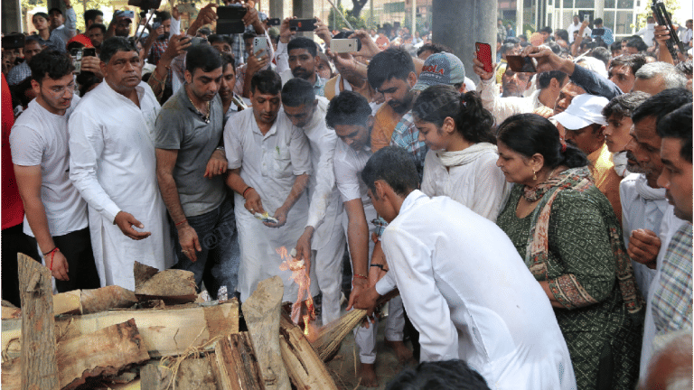 Wrapped in BJP flag, Sonali Phogat’s body cremated in Hisar, 16-yr-old daughter lights pyre