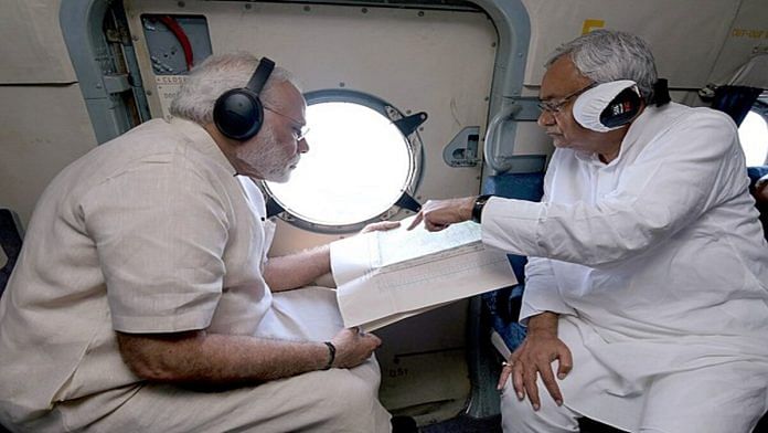 PM Modi and Nitish Kumar conducting an aerial survey of flood affected areas, in Bihar in August, 2017 | Wikimedia Commons