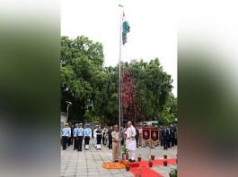 New Delhi: Defence Minister Rajnath Singh hoists national flag at his residence