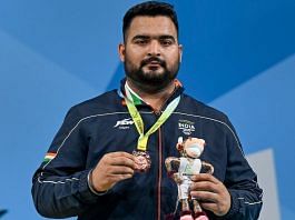 Lovepreet Singh poses for a photo after winning the bronze medal at the Commonwealth Games 2022, in Birmingham, UK, on 3 August 2022 | PTI