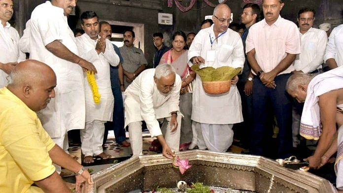 Bihar Chief Minister Nitish Kumar at the Vishnupad Temple in Gaya with IT minister Israel Mansuri (in grey, towards the back), among others, 22 August | Credit: ANI Photo