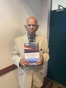 Author and former diplomat K.P. Fabian poses with his book at the book discussion on 17 August at India International Centre, New Delhi | Gaurvi Narang | ThePrint 