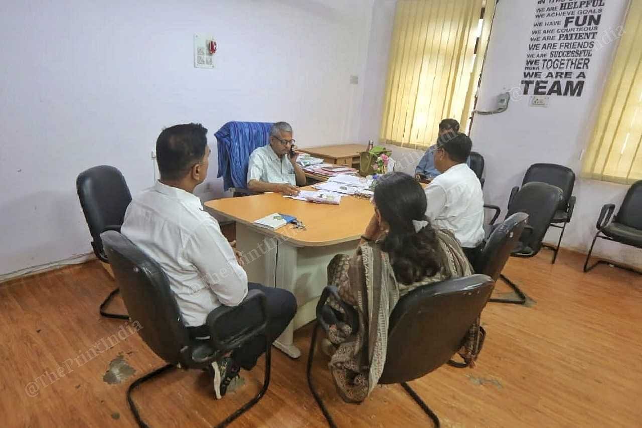 Surya Prakash Trivedi, joint director, animal husbandry, and other officials at his office in Udaipur, which is being used as a Covid-style control room to manage the lumpy skin disease outbreak in the district | Praveen Jain | ThePrint