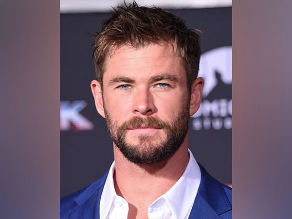 Chris Hemsworths Haircuts Through The Years Photos  Hollywood Life