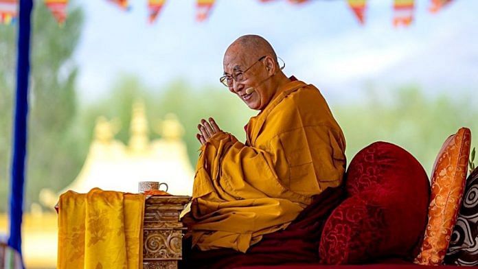 Tibetan spiritual leader Dalai Lama smiling to the members of audience during the first day of his teaching at the Shewatsel Teaching Ground in Leh, on 28 July 2022 | ANI
