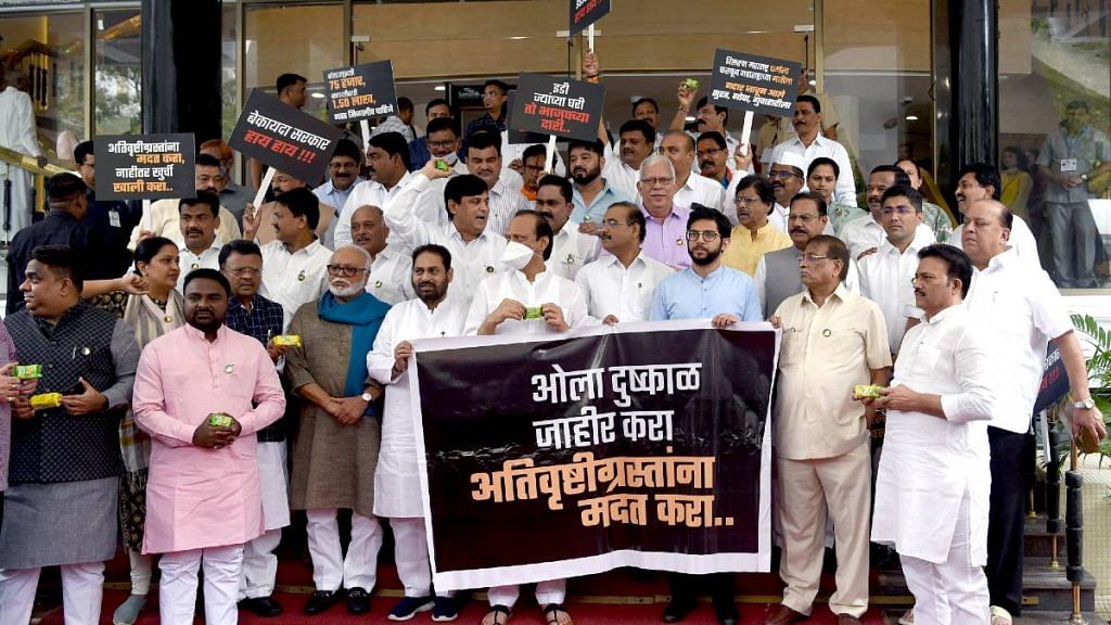 Maha Vikas Aghadi leaders, including Shiv Sena's Aaditya Thackeray & Nationalist Congress Party's Ajit Pawar, stage a protest against the Maharashtra government at the Vidhan Sabha in Mumbai Tuesday, demanding compensation for farmers whose crops got damaged due to heavy rains | ANI