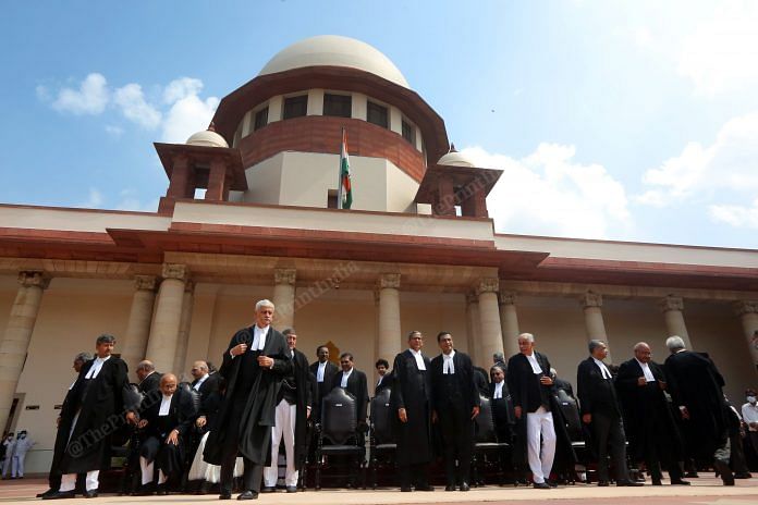 Chief Justice of India NV Ramana, CJI-designate Justice Uday Lalit and other judges during the group picture at Supreme Court in New Delhi | Praveen Jain | ThePrint