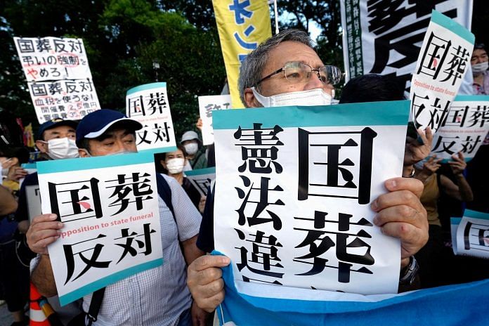 People stage a protest in front of the main gate of Japan's parliament building against the state paying for assassinated former Prime Minister Shinzo Abe's funeral in Tokyo | File photo: Reuters