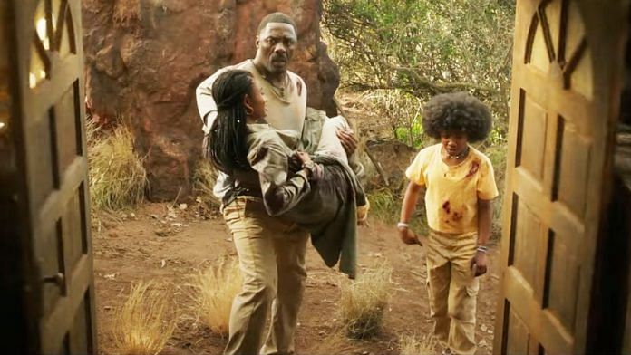 Idris Elba with his co-stars in Beast film | Netflix