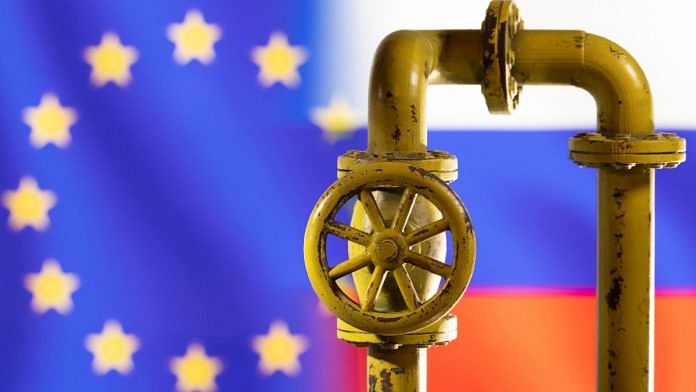 A model of the natural gas pipeline is seen in front of displayed word EU and Russia flag colours | Illustration: Reuters/Dado Ruvic