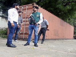 Special Cell members stand guard near a container with more than 20,000 kg of licorice root coated with heroin that was seized from JNPT Port in Mumbai | ANI