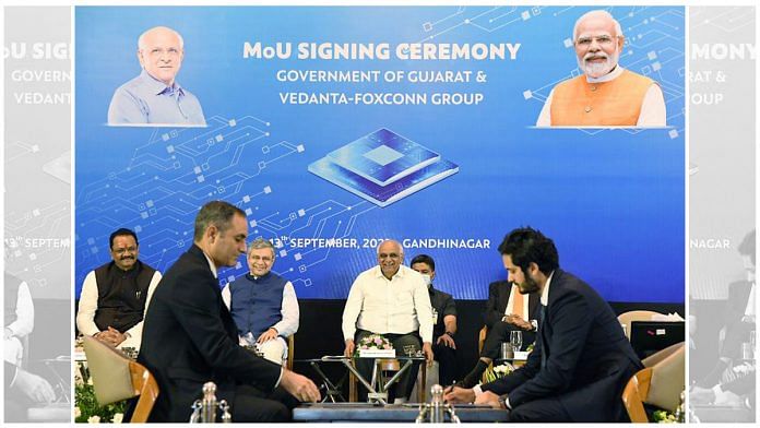 The MoU signing ceremony between the Gujarat state government and the Vedanta-Foxconn Group to set up a semiconductor plant, in Gandhinagar, on Tuesday | ANI