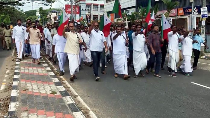 Members of Popular Front of India (PFI) in Kerala protest against the NIA raids, 23 September | Credit: ANI Photo