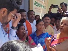 Screengrab of Union Finance Minister Nirmala Sitharaman talking with Kamareddy Collector Jitesh V. Patil over photographs of the PM not displayed at a ration shop | Twitter | @nsitharaman