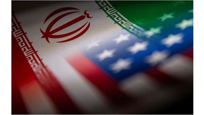 File Photo of Iran's and U.S.' flags are seen printed on paper in this illustration taken 27 January, 2022 | Reuters