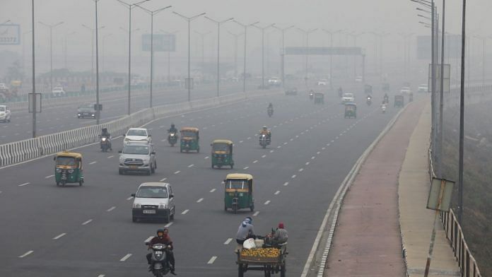 Vehicles are seen on a highway on a smoggy morning in New Delhi, on 2 December 2021 | Reuters file photo