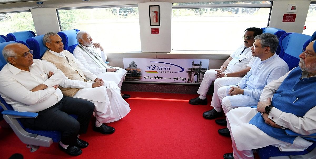 PM Modi, Gujarat Governor Acharya Devvrat, CM Bhupendra Patel, state BJP chief C.R. Patil, and Union ministers Ashwini Vaishnaw and Hardeep Singh Puri onboard Vande Bharat Express Friday | ANI