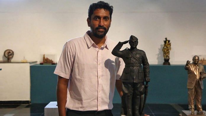 Arun Yogiraj with a small statue of Netaji Subhas Chandra Bose | Manisha Mondal | ThePrint
