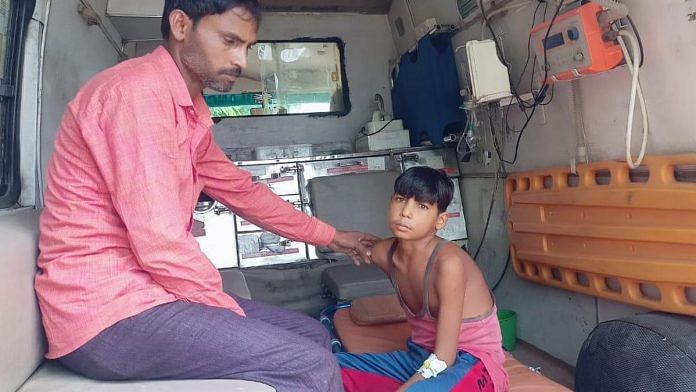 Nikhit Kumar and his father Raju Dohare in an ambulance, days before the teen's death | By special arrangement