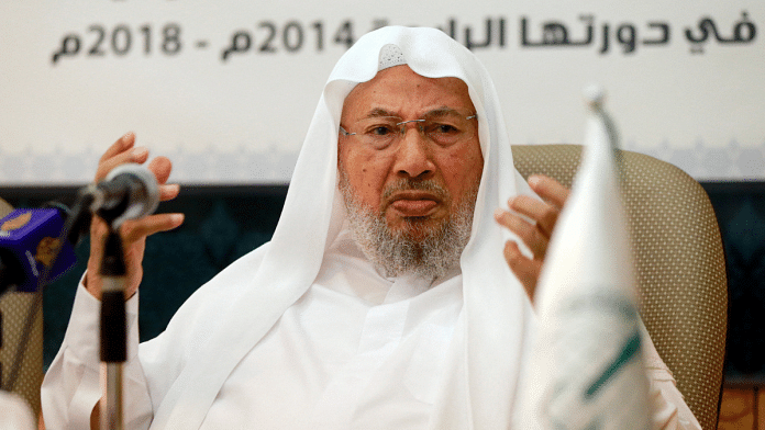 File Photo: Chairman of the International Union of Muslim Scholars Youssef al-Qaradawi (R) speaks during a news conference in Doha 23 June, 2014. Reuters