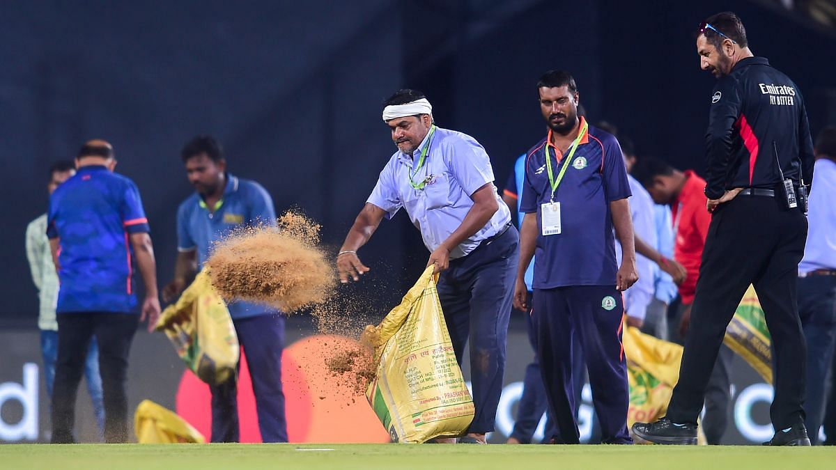 Groundsmen dry the wet outfield ahead of the match in Nagpur | PTI