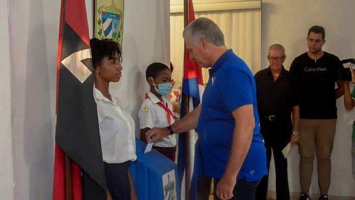Cuba's President Miguel Diaz-Canel casts his vote at a polling station during the new Family Code referendum in Havana, on 25 September 2022 | Courtesy of Estudios Revolucion/Handout via Reuters