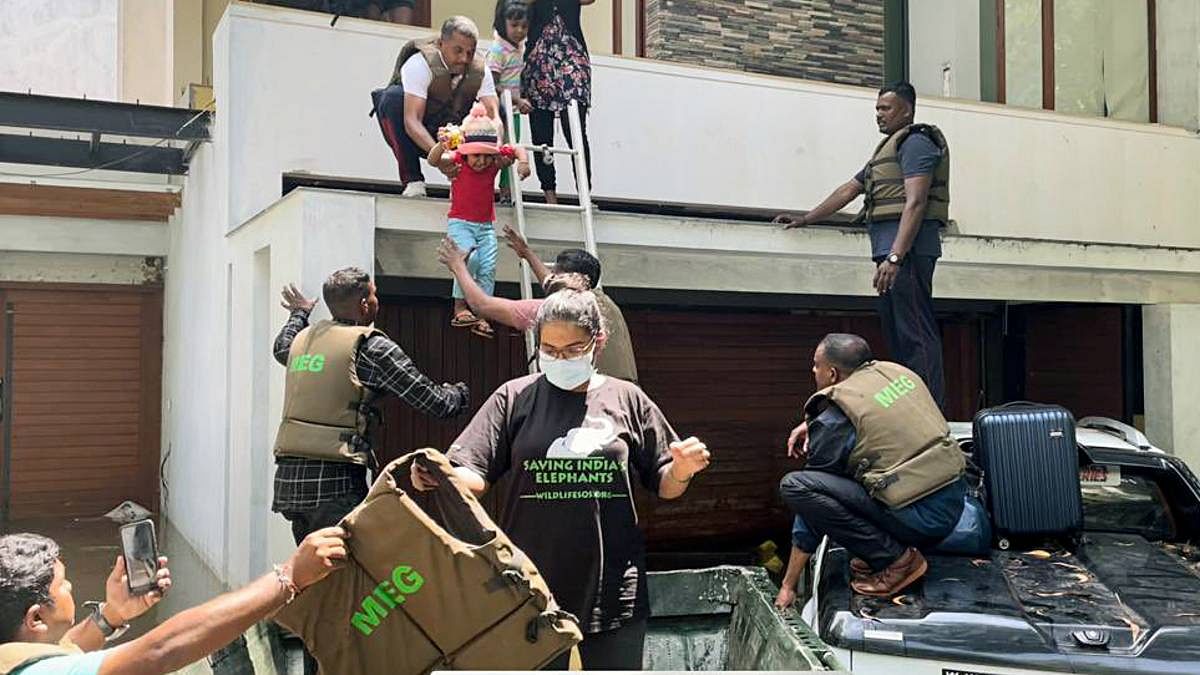 Residents of a flood-affected colony in Bengaluru being rescued by Flood Relief Task Force personnel | ANI