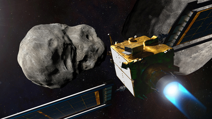 NASA's Double Asteroid Redirection Test (DART) spacecraft prior to impact at the Didymos binary asteroid system showed in this undated illustration handout. NASA/Johns Hopkins/Handout via REUTERS