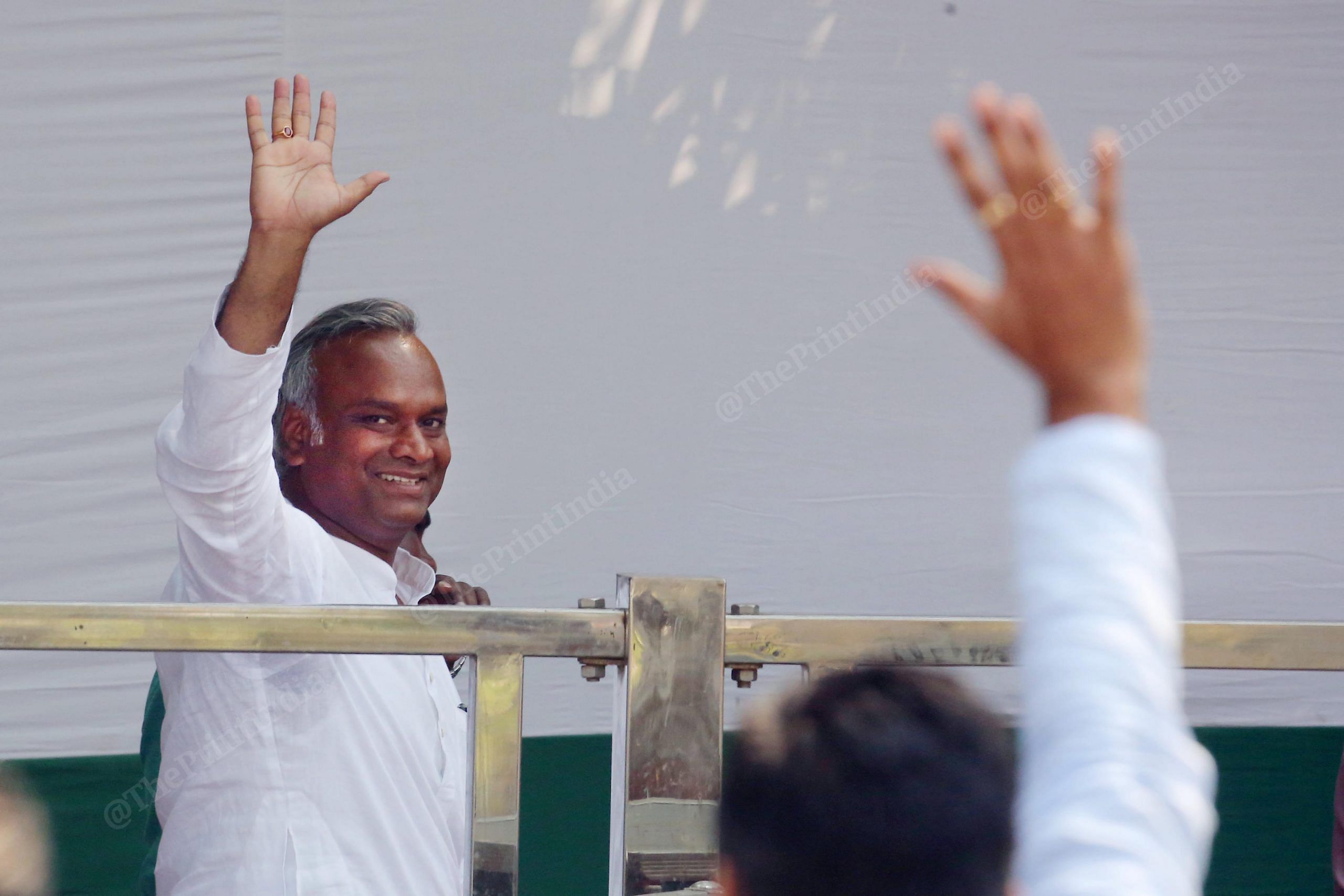 Newly Elected Congress President Mallikarjun kharge son Priyank Kharge wave to party leaders during a ceremony for presentation of certificate of election to the former, at AICC Headquarters | Praveen Jain | ThePrint
