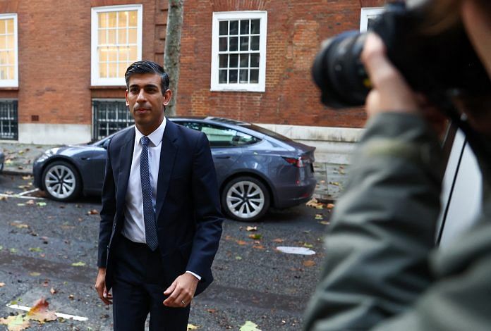 Britain's Conservative MP Rishi Sunak walks next to his campaign headquarters in London, Britain, 24 October, 2022 | Reuters