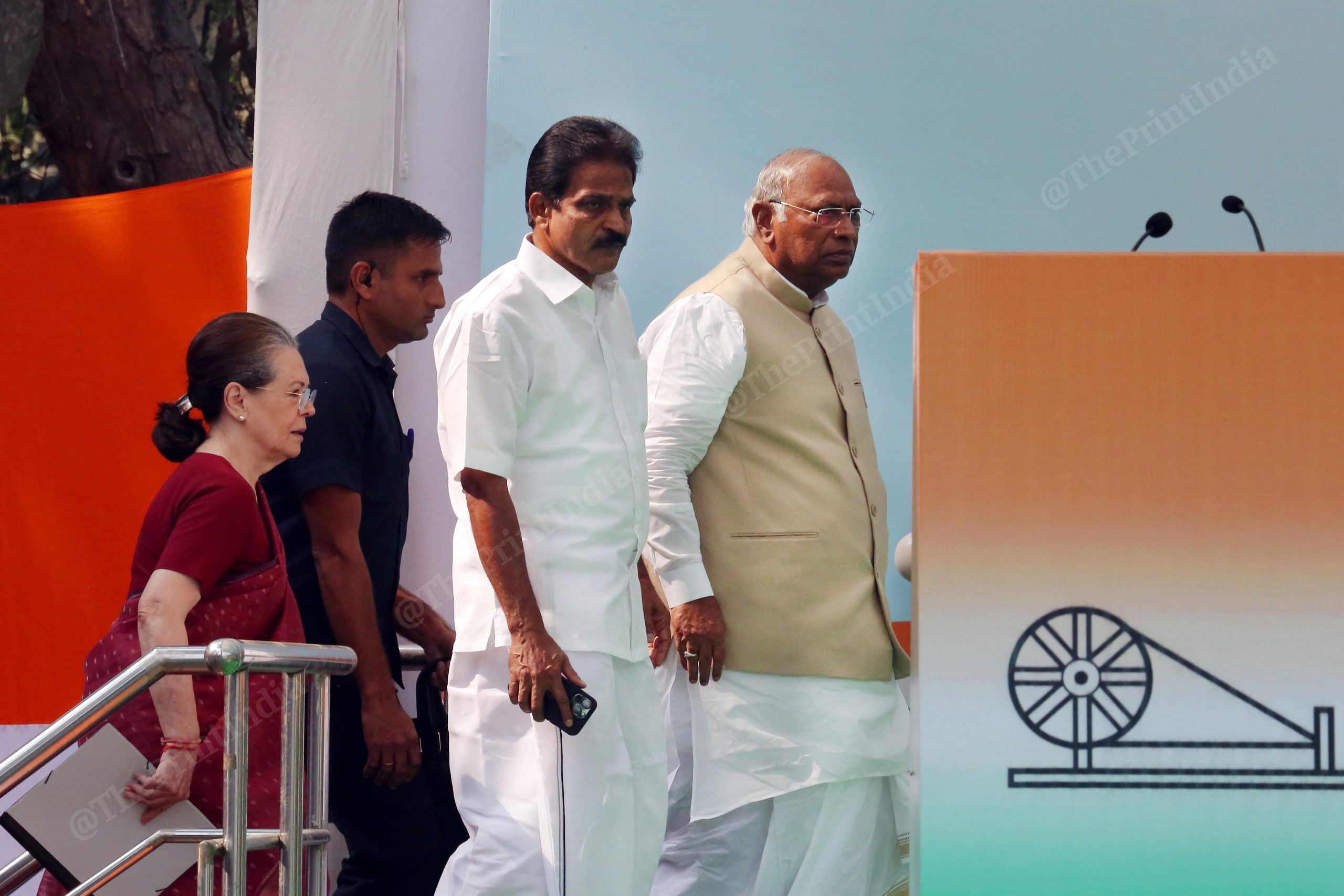 Congress President-elect Mallikarjun Kharge with former party president Sonia Gandhi, and KC Venugopal during a ceremony for presentation of certificate of election to him, at AICC Headquarters in New Delhi | Praveen Jain | ThePrint
