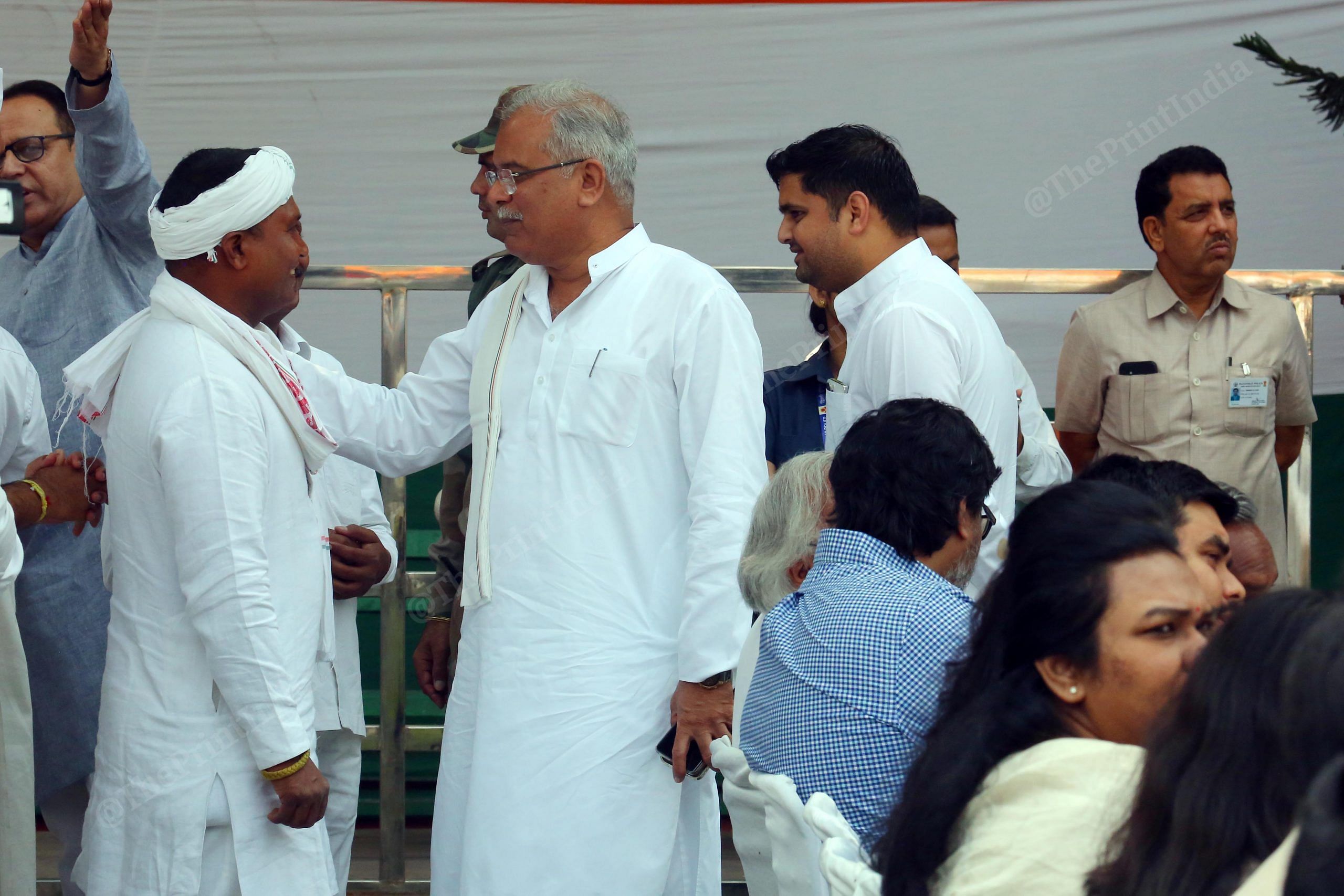 Chhattisgarh CM Bhupesh Baghel interats with Youth Congress President Srinivas BV during a ceremony for presentation of certificate of election to the former, at AICC Headquarters | Praveen Jain | ThePrint