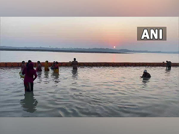 Prayagraj: Devotees take holy dip in Sangam in view of partial solar eclipse