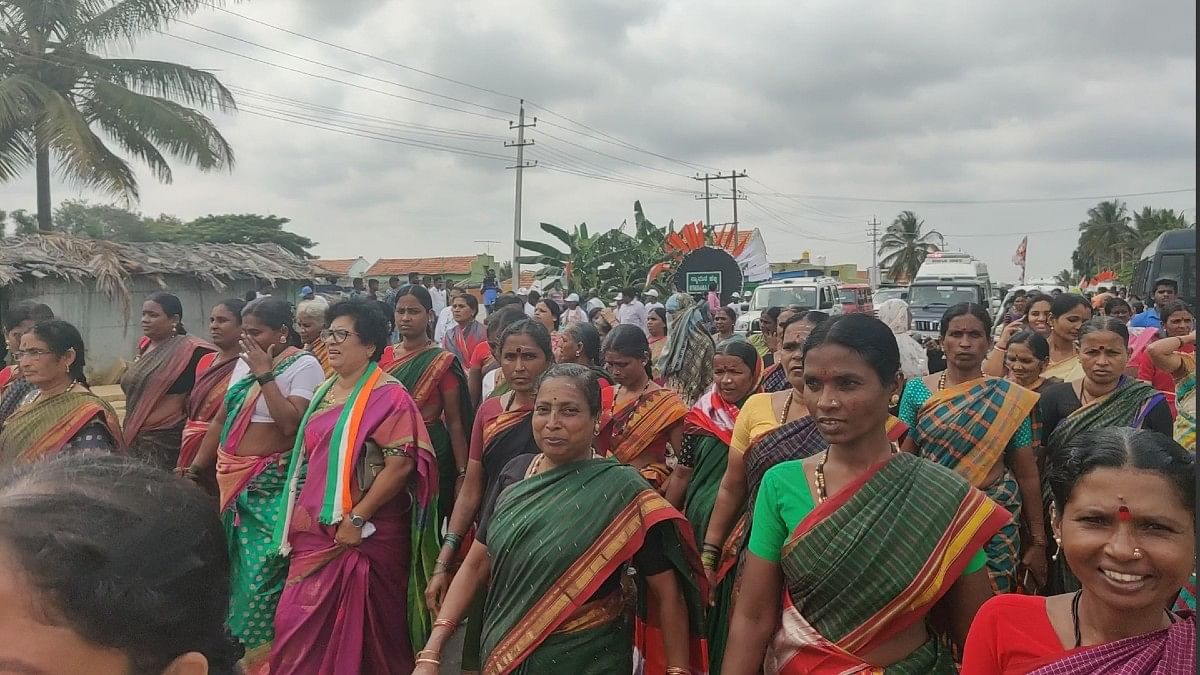 Women supporters of Congress wait to catch a glimpse of party president Sonia Gandhi during Bharat Jodo Yatra Thursday in Mandya | Disha Verma | ThePrint