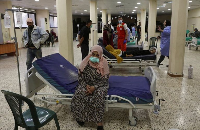Battling cholera, Lebanon gets first vaccines, and sharp words, from France