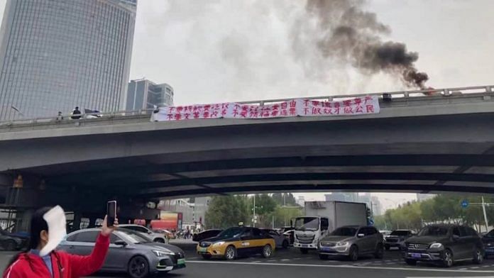 Beijing authorities removed rare protest banners from an overpass in city, according to images circulated widely on social media on Thursday | Reuters
